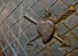 These are antique carved wood panels, sold individually. Possibly previously doors or inset panels. There are ribbons on the back for hanging from a picture hook or nail. Quittner. 