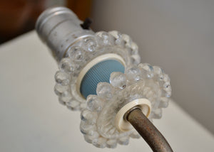Sweet vintage bubbly glass plug-in sconce with blue and white plastic (yes, plastic) details. This light is likely 1950s and has a metal hanger on the back to go onto your wall. The switch is on the socket. Quittner