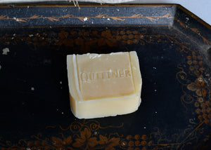 Our pure tallow soap has three ingredients: grass-fed and grass-finished tallow, sodium hydroxide (lye), and water.&nbsp;  We make our beef tallow in-house from animals raised just a few miles from our workshop by Hover Farm and Gulden Farm. This is true old-fashioned soap with a local focus. The color will vary between batches depending on what season the cattle were processed in, and where they were in their feeding cycle. Each bar ships wrapped in paper or tissue. Quittner.