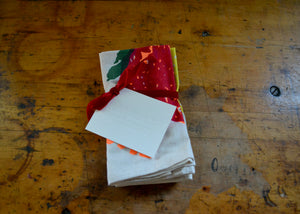folded napkin set with large strawberry