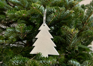 A classic fir tree ornament. Draw on it with a whiteboard marker and easily wipe clean. Made in by us in the Hudson Valley of New York. Quittner.