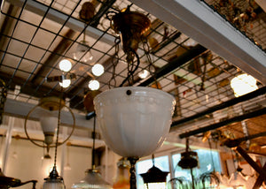 Antique 1920s chandelier with white milk glass shade. Quittner.
