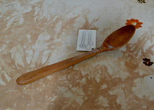 Hand-carved wood spoon for cooking and serving made of cherry. Ideal for stirring stews and scooping sides.

Dimensions: 13 inches long

This piece was carved by Mark Power in the Hudson Valley of New York. He uses hardwoods local to the Hudson Valley sourced from fallen trees, and trimmings from local orchards, to create functional cookware that lasts far past a lifetime. Mark carves while the wood is green, or still fresh, using edge tools.