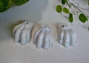 Our planter feet increase air flow around your precious plants indoors or outside. Use with or without a saucer. Each order includes 3 feet, enough for one pot. As the feet are glazed, they are safe to use directly on a wood floor or surface. Quittner.