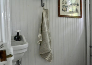 Our linen tea towels are kitchen workhorses. Use as a hand towel, dish towel, potholder, or extra large napkin. A linen hanging loop make it easy to hang and quick to dry. Quittner.