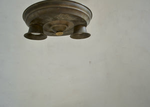 antique Ceiling light fixture on a plain wall