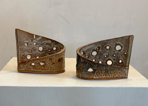 This tea light luminary was handmade by potter Lara Gillett using slab-building techniques. It features a spot motif and a choice of glaze.