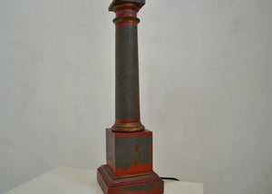Antique metal table lamp with extant red paint, restored and rewired in our workshop. Quittner.