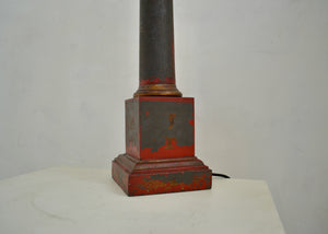Antique metal table lamp with extant red paint, restored and rewired in our workshop. Quittner.