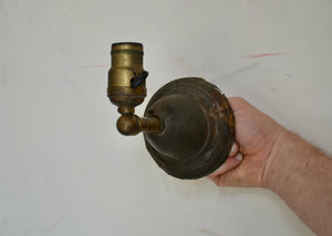 Antique brass sconce with wear and patina, including paint smudges. Fully rewired. Please look carefully at images to confirm condition. Switch on socket. Quittner.