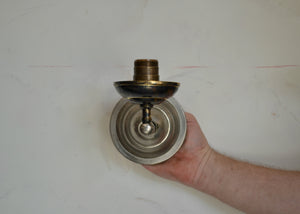 Antique nickel and brass-toned sconce with wear and patina. Fully rewired. Please look carefully at images to confirm condition. Quittner.