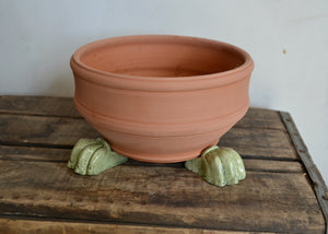 Our planter feet increase air flow around your precious plants indoors or outside. Use with or without a saucer. Each order includes 3 feet, enough for one pot. As the feet are glazed, they are safe to use directly on a wood floor or surface. Quittner.