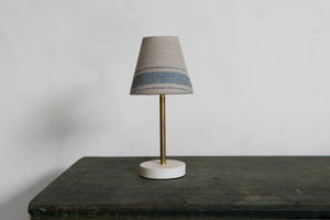 Our surface lamp is the perfect small lamp for your counter, dresser, desk, or bedside table. Brass and porcelain with linen shade, classic, simple, clean design, old house style, cottage, English, hudson valley