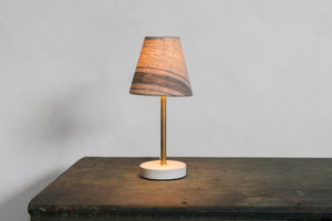 Our surface lamp is the perfect small lamp for your counter, dresser, desk, or bedside table. Brass and porcelain with linen shade, classic, simple, clean design, old house style, cottage, English