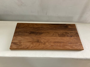 a wooden cutting board with a wooden cutting board 